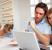 Young Couple reviewing mortgage proposal