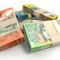 bundles of Australian currency of different denominations