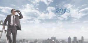 man on ladder looking at number 2018 - our Economic and Markets Outlook 2018